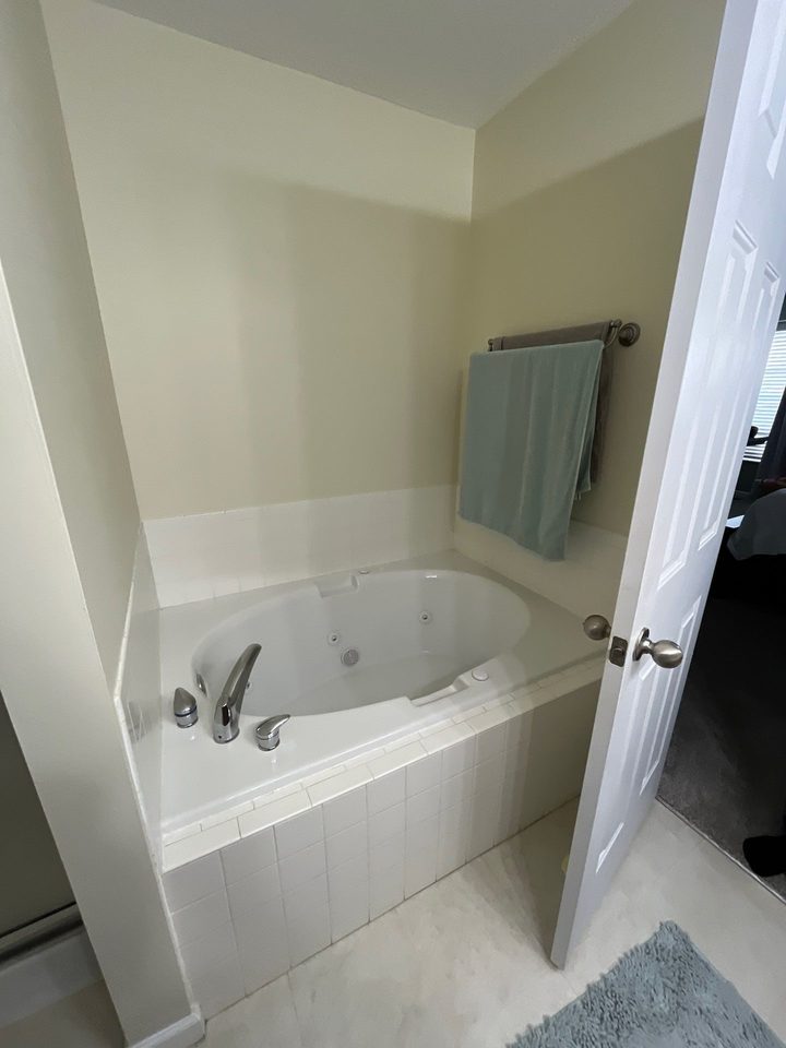 Before: an old jetted whirlpool tub